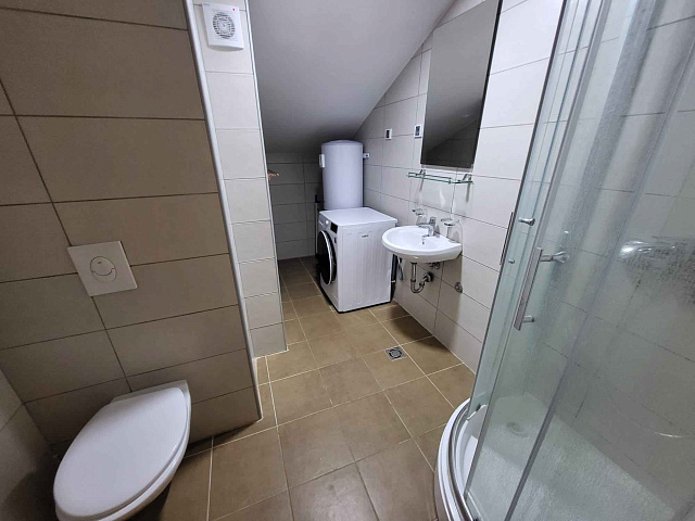 Two bedroom apartment in a new building in Tivat — photo 11